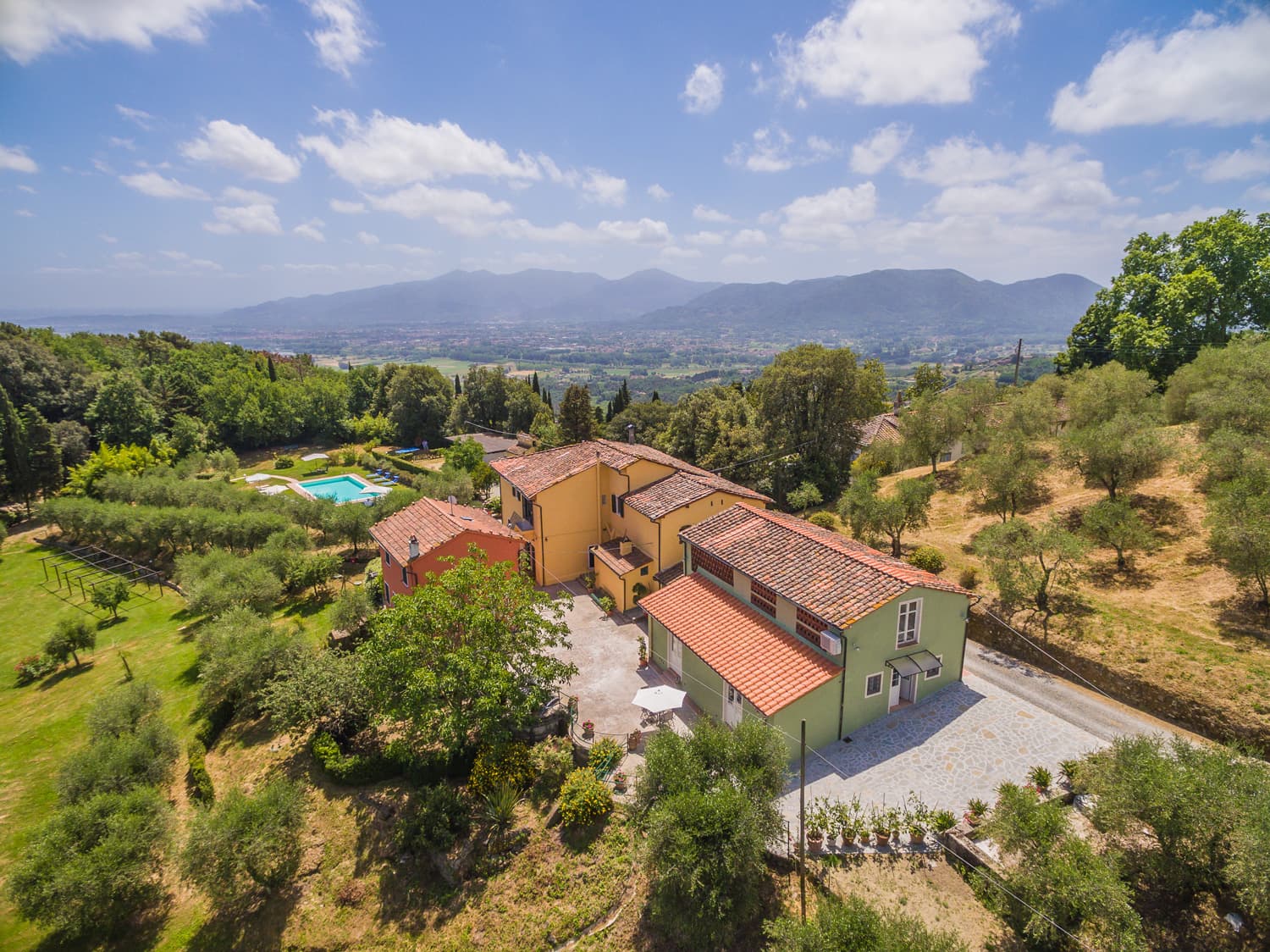 Aerial view of Tenuta Bellosguardo among olive groves and vineyards